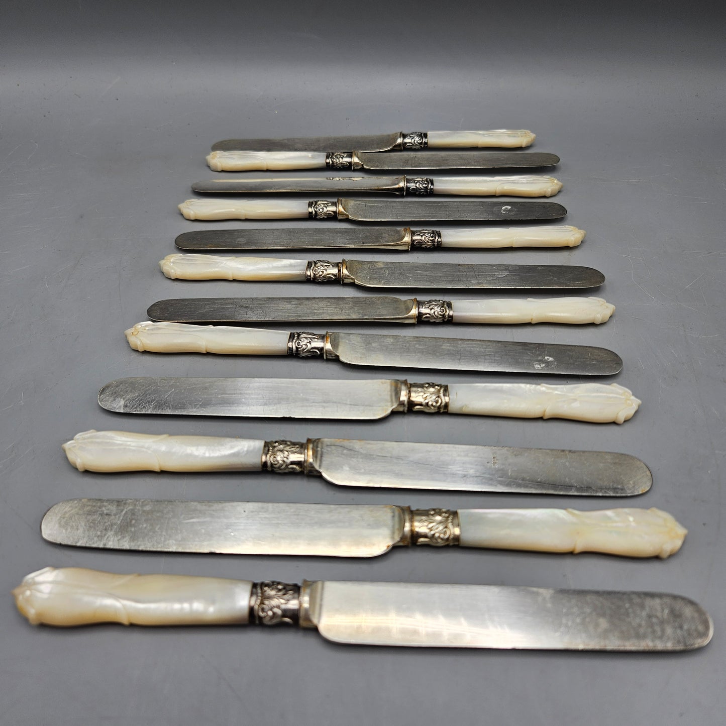 Set of 12 Antique Mother of Pearl Handle Silver Plate Knives