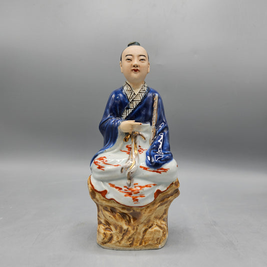 Vintage Porcelain Figure of Sitting Man in Blue Jacket