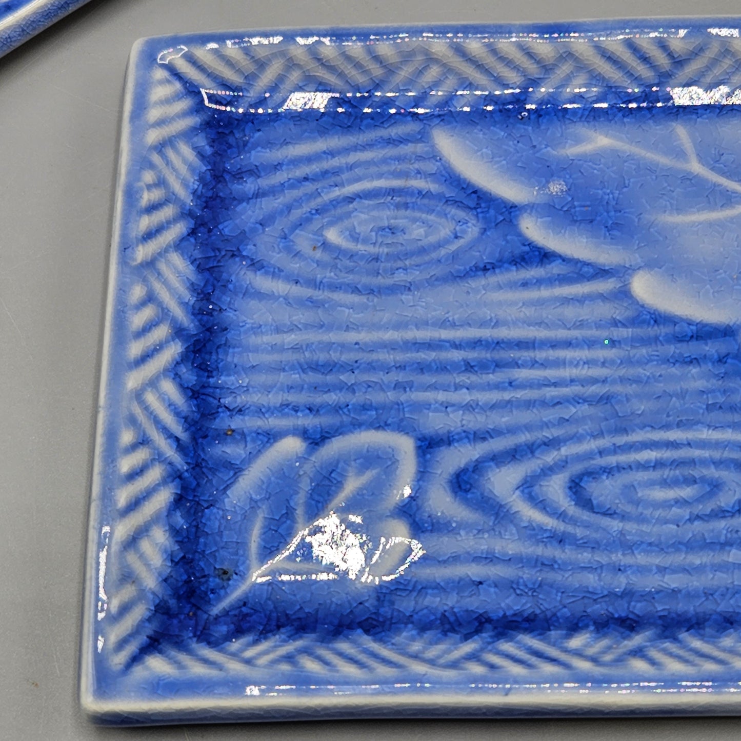 Two Studio Pottery Blue Woodgrain Porcelain Plates