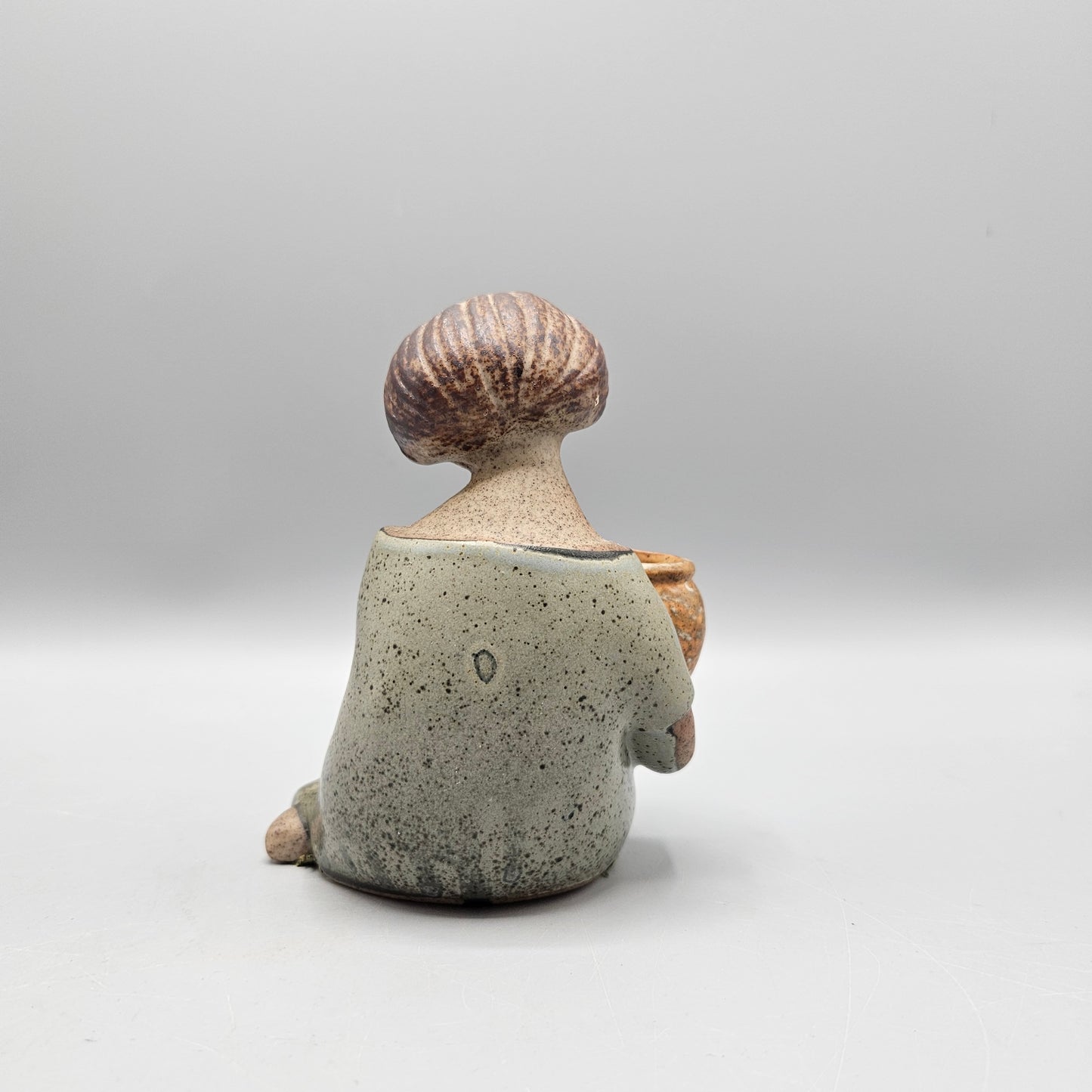 Japanese Stoneware Girl with Flower Pot Figurine