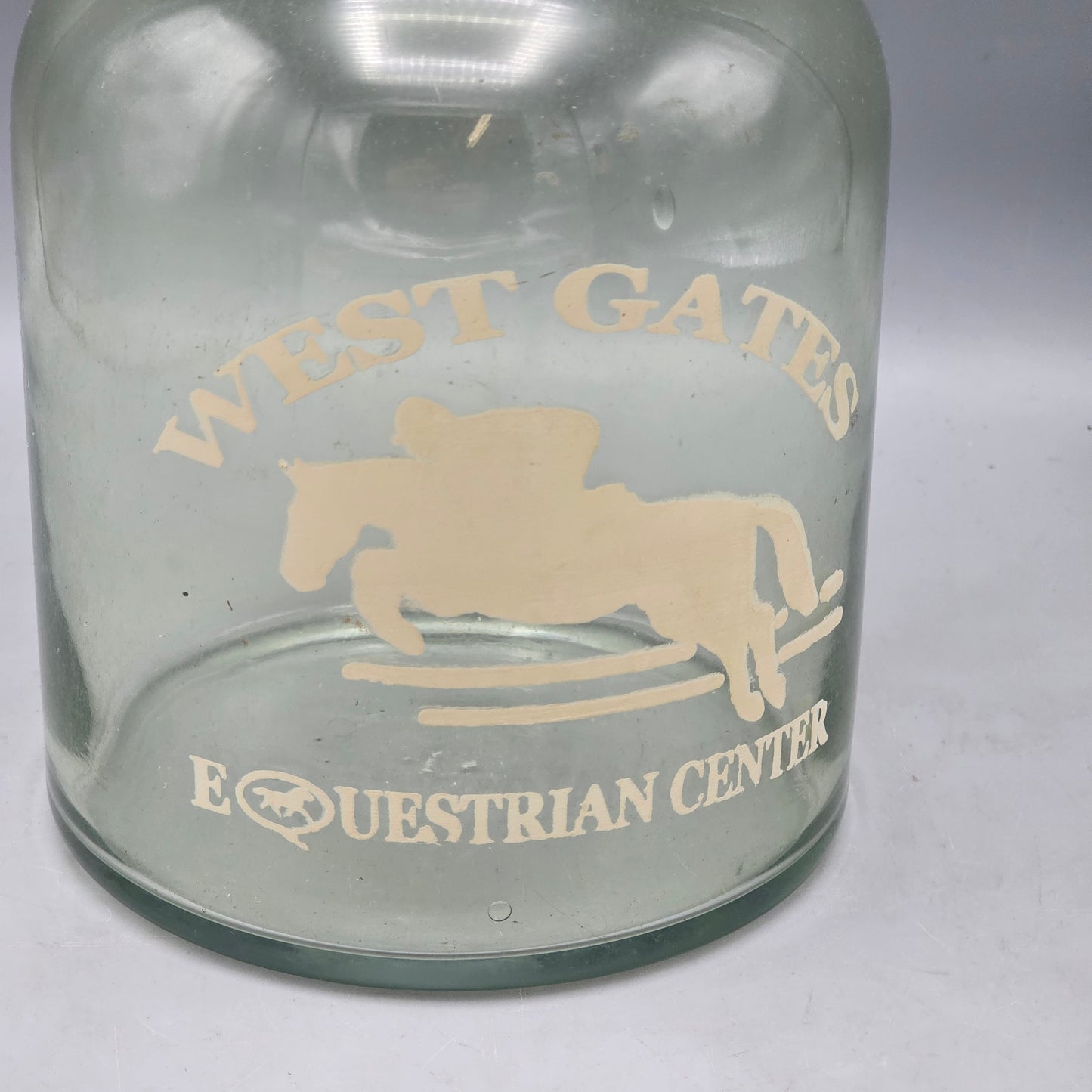 West Gate Equestrian Center Horse Jumping Glass Bottle