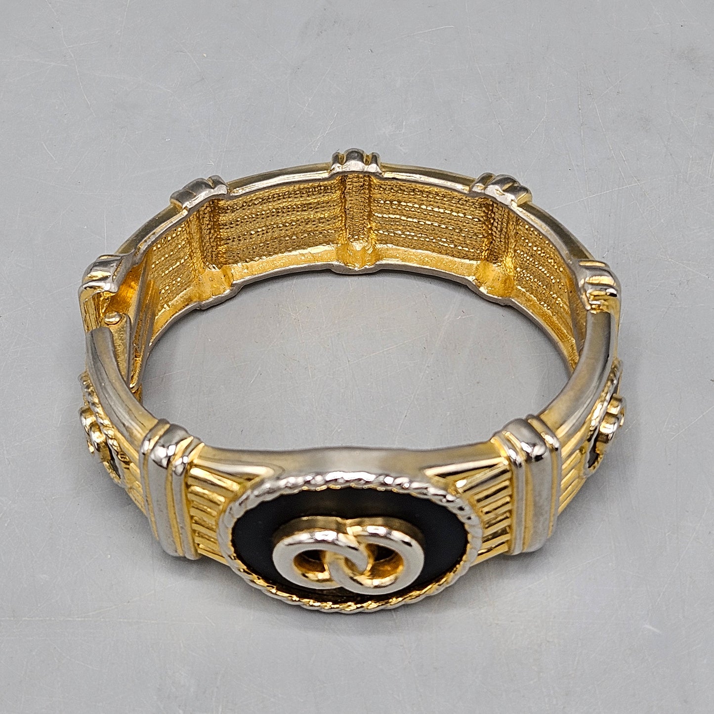 Vintage Hinged Bangle Bracelet with Double Circle Design & Raised Gold Tone