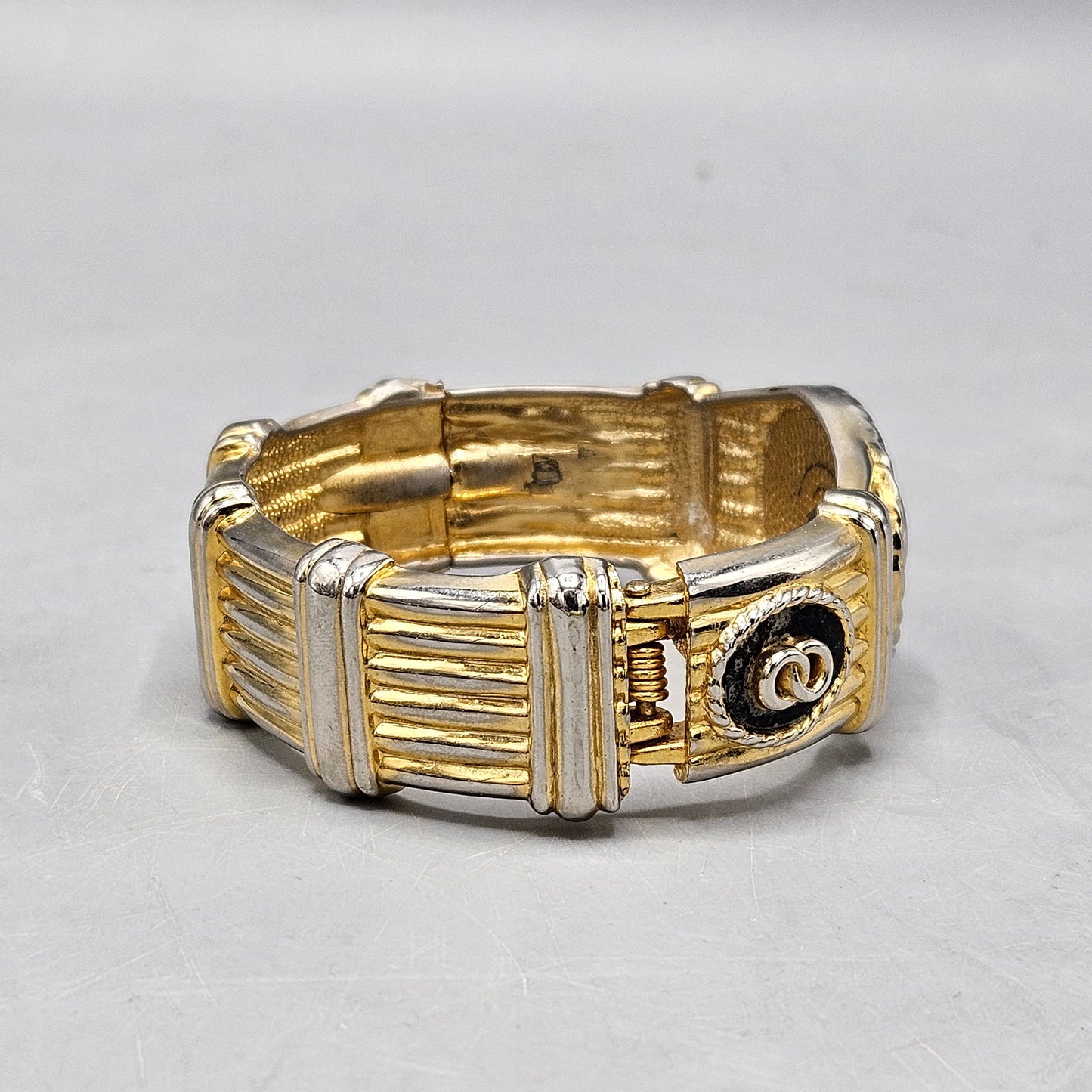 Vintage Hinged Bangle Bracelet with Double Circle Design & Raised Gold Tone