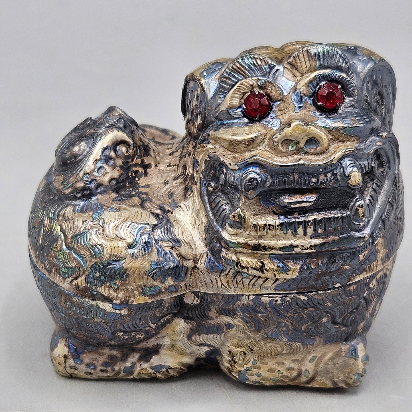 Vintage Chased Silver Lion-Shaped Betel Box with Red Glass Eyes from Cambodia