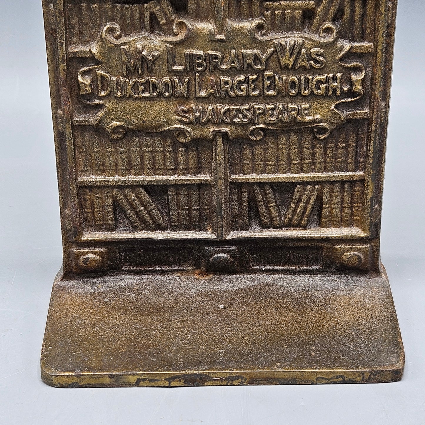 Single Vintage Heavy Metal Bookend with Shakespeare Quote “My Library Was Dukedom Large Enough”