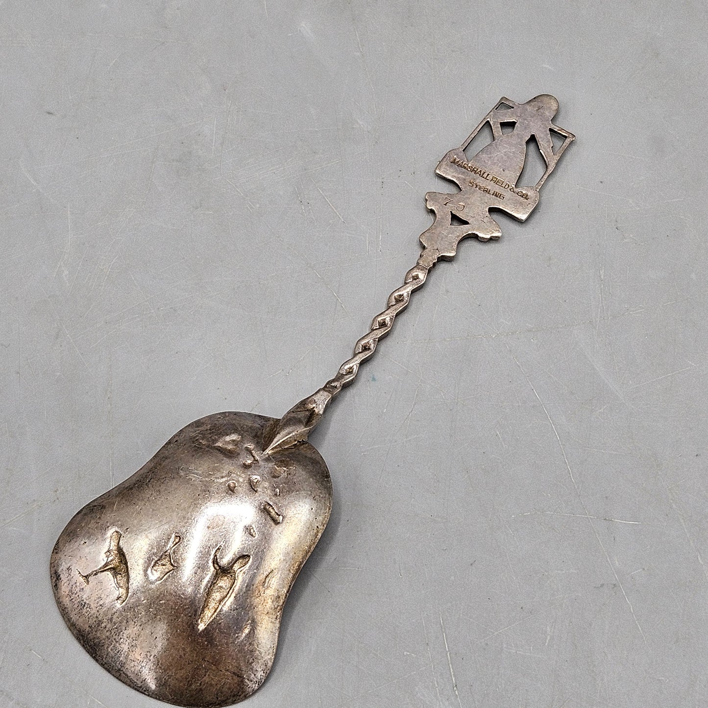 Vintage Marshall Field & Co. Sterling Sugar Spoon with Dutch Scene