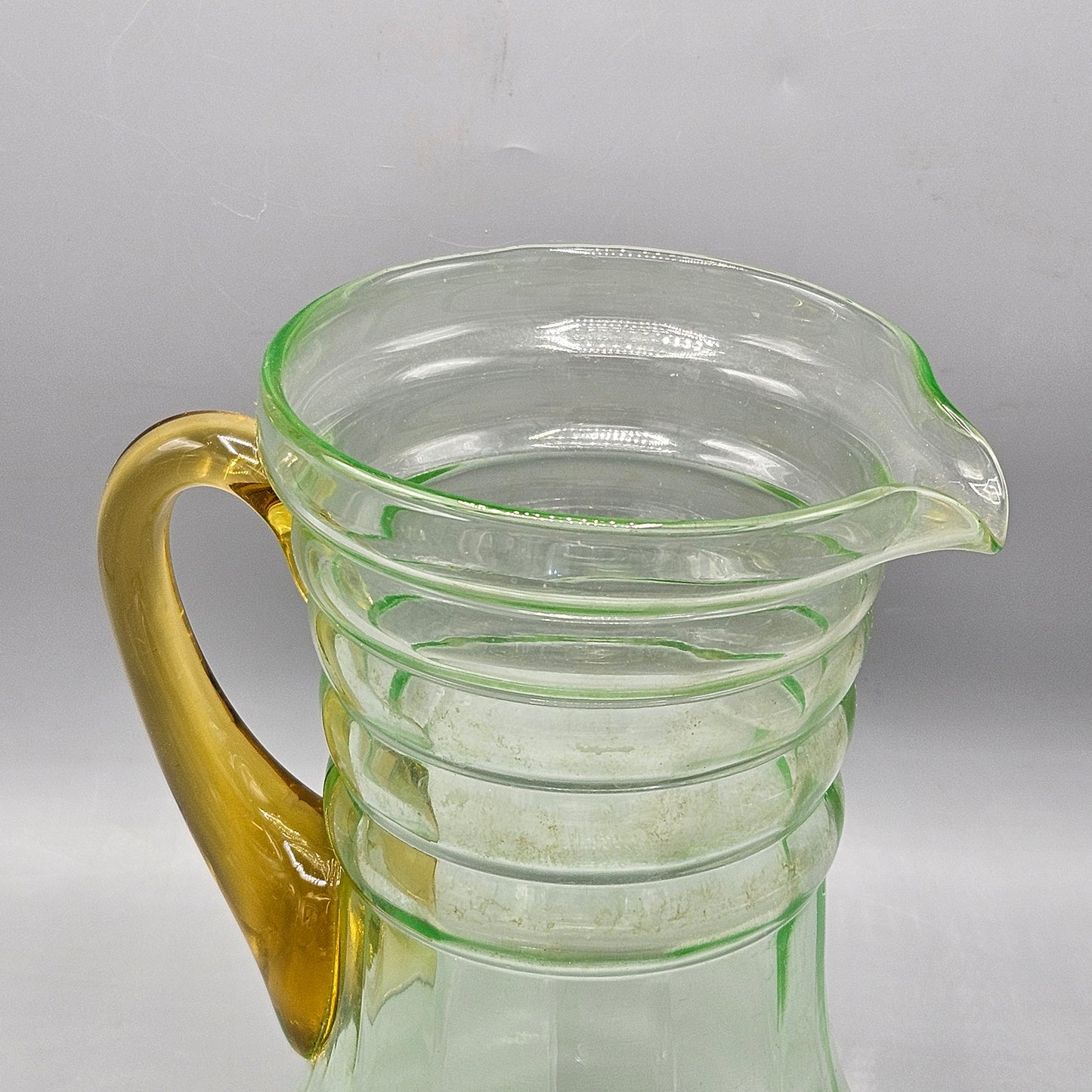 Vintage Green Vaseline glass Pitcher with Yellow Handle