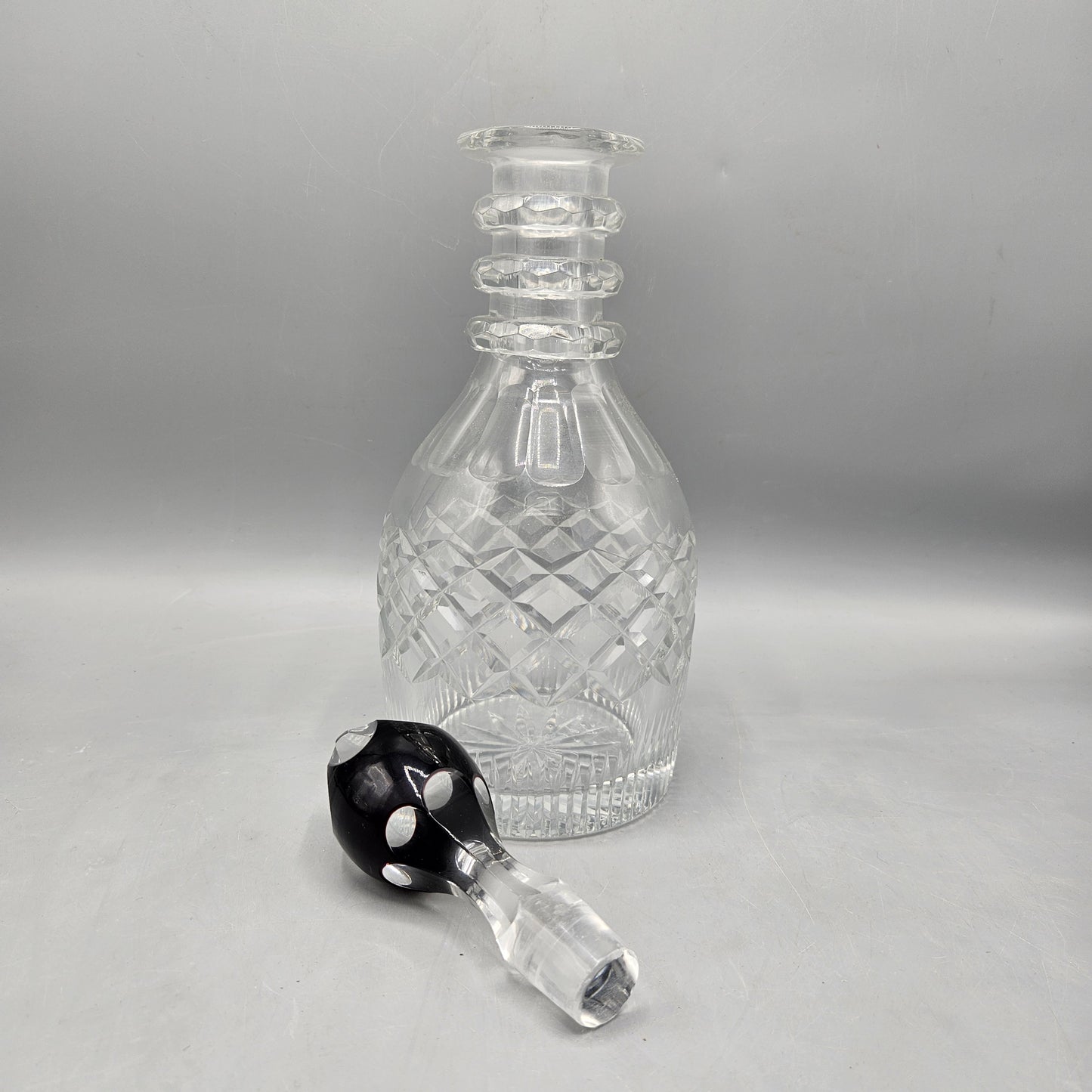 Vintage Crystal Decanter with Black Stopper