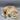 Two Sleeping Fox Figurines