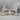 Pair Moore Brothers Porcelain Figural Shell Dishes with Cherubs