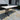 Travertine Marble Top Patio Dining Table with Iron Scroll Base