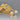 Faux pearl details and gold tone stems of brooch