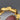 Close-up of brooch clasp and maker's mark on the reverse